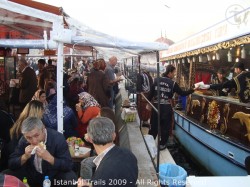 Fish sandwiches being prepared on a boat