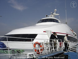 Image of a sea bus or quick ferry docking in Istanbul, Turkey.